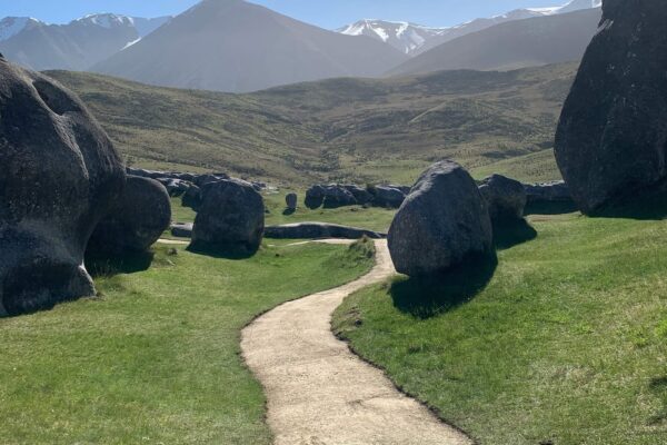 Completed walking track construction through the limestone landscapes of Kura Tawhiti Castle Hill, providing improved access across a sensitive recreation area. The image shows civil construction, park construction, siteworks and erosion control completed by civil contractors in New Zealand.