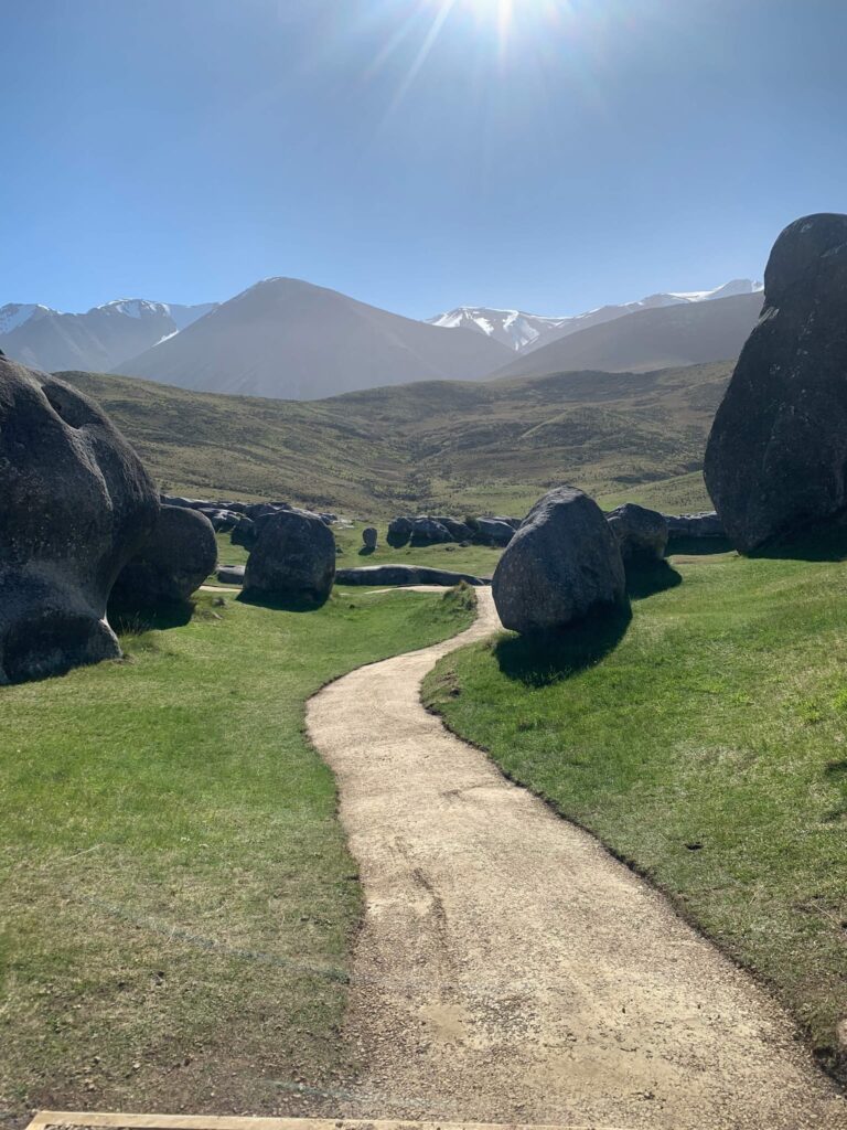 Completed walking track construction through the limestone landscapes of Kura Tawhiti Castle Hill, providing improved access across a sensitive recreation area. The image shows civil construction, park construction, siteworks and erosion control completed by civil contractors in New Zealand.